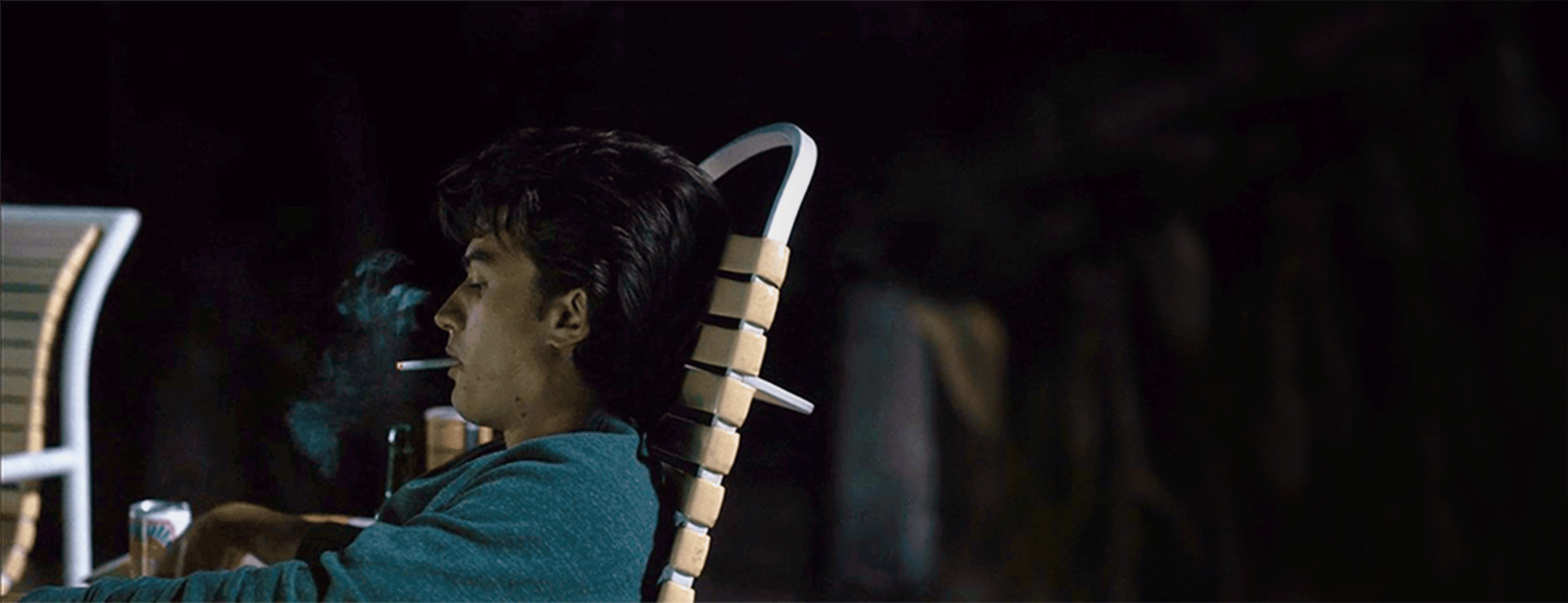 Still from Stranger Things with teen smoking